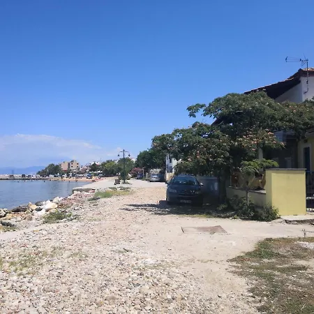 The Yellow House By The Sea